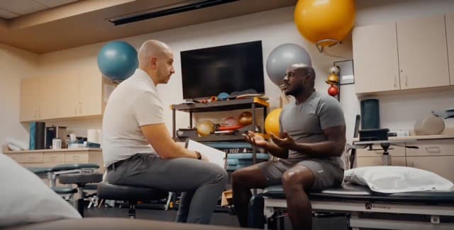 Dr. Mark Kargela with a patient